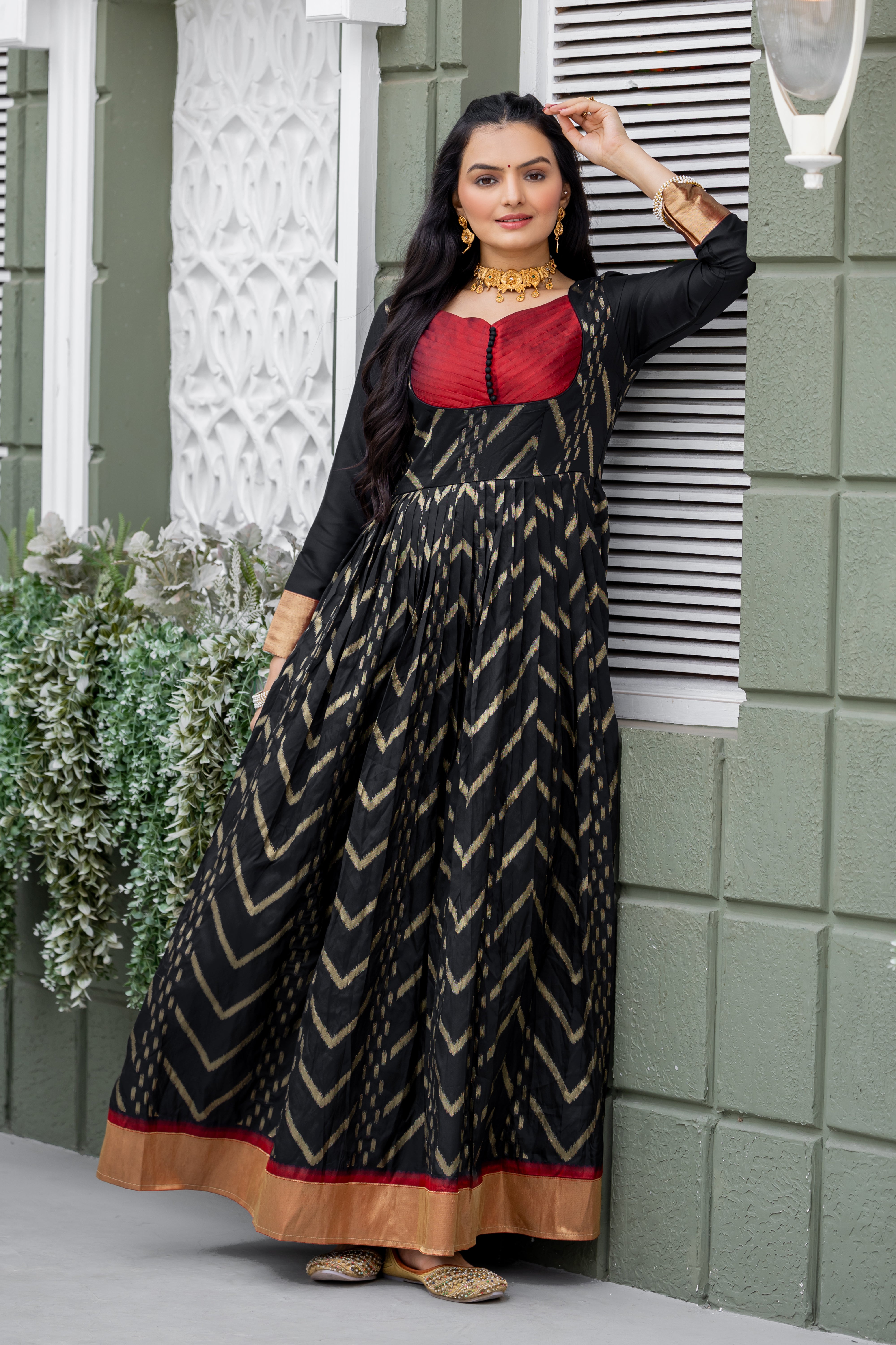 "Chevron Zari-Woven Black Gown with Pleated Yoke & Zari Border Panel"