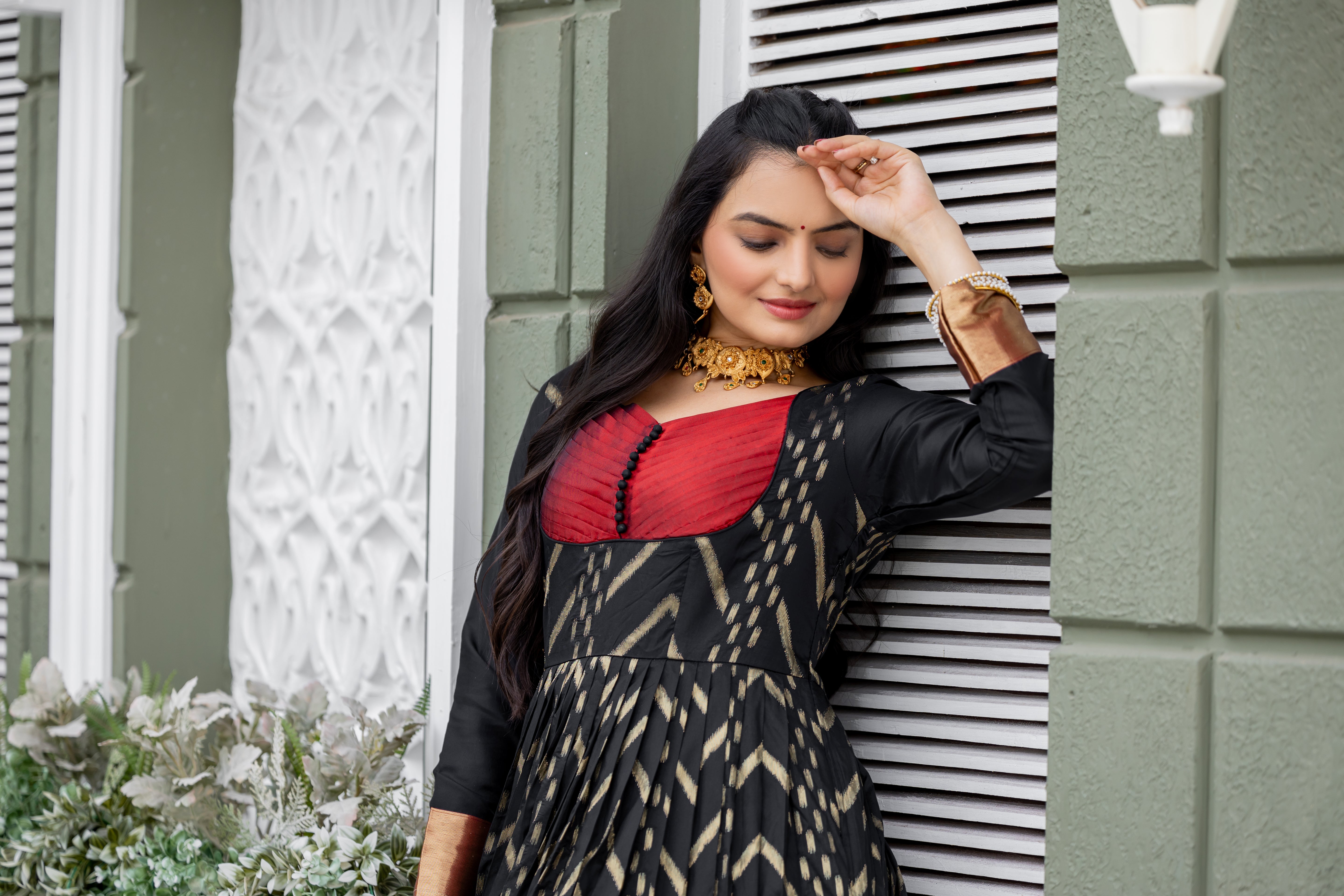 "Chevron Zari-Woven Black Gown with Pleated Yoke & Zari Border Panel"